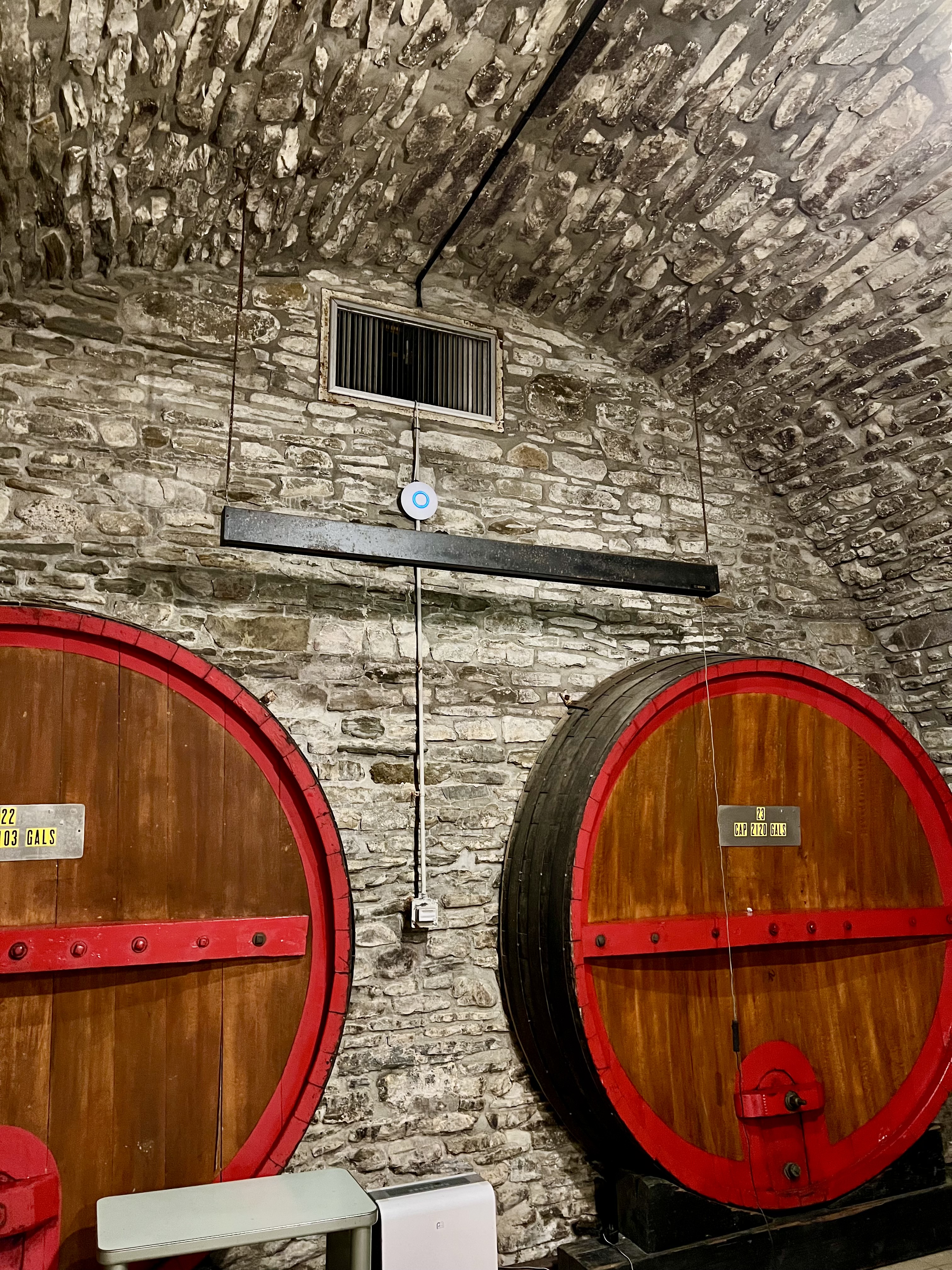 UniFi access point installed in stone wine cellar